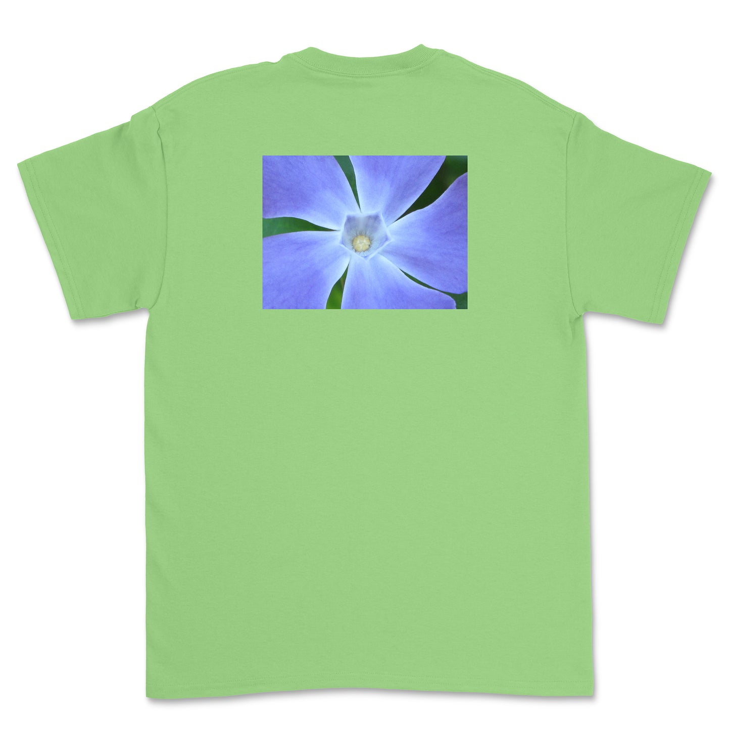 Green t-shirt with a purple flower graphic on the back against a white background