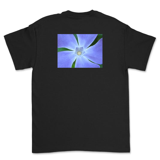 Black t-shirt with a purple flower graphic on the back against a white background