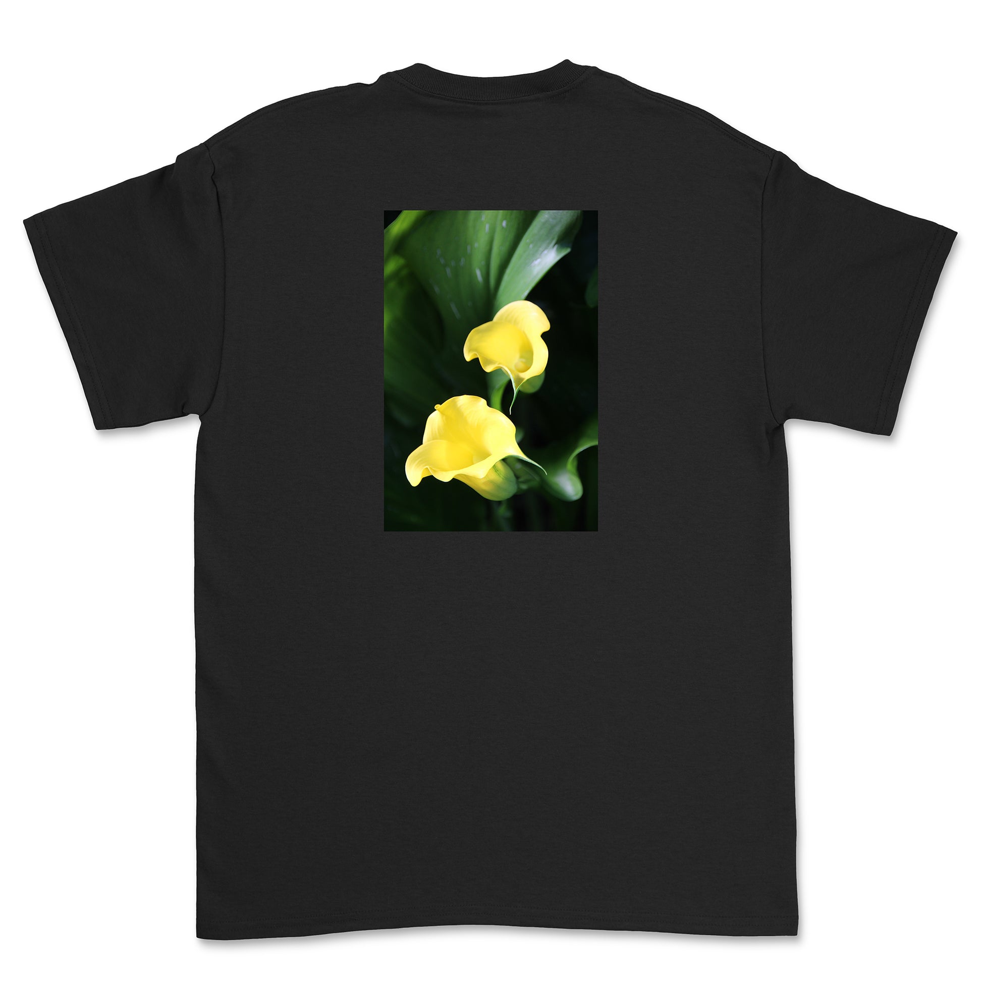 Black t-shirt with a graphic of two yellow flowers on a white background